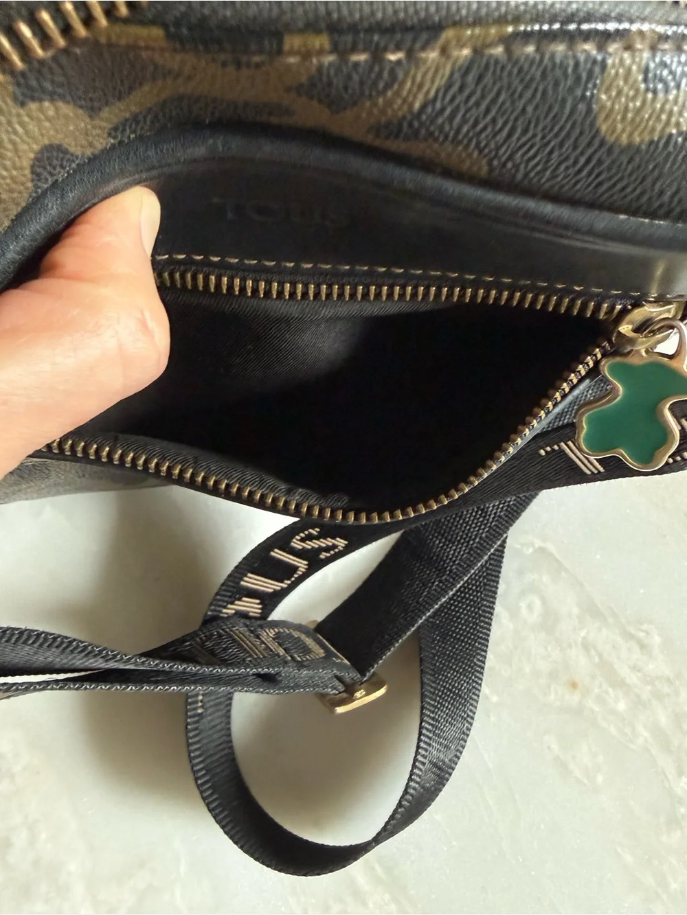 TOUS Chaos Black Crossbody Bag with Brown Pattern and Green Bear Charm
